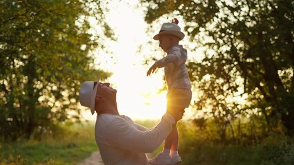 People having fun outdoors on a summer day at sunset