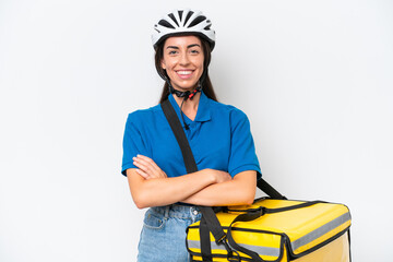 Young caucasian woman with thermal backpack isolated on white background keeping the arms crossed in frontal position