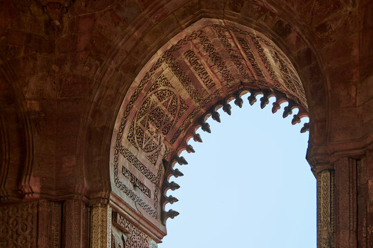 Alai Darwaza landmark part Qutb complex in South Delhi, India, Alai Darwaza main gateway decorated with red sandstone and inlaid white marble decorations, popular touristic spot in New Delhi