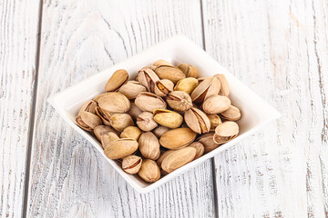 Salted tasty pistachio nuts heap