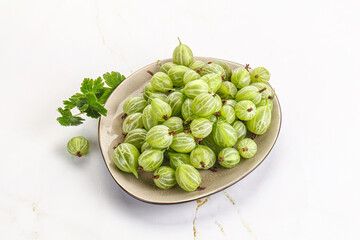 Sweet ripe gooseberries in the bowl