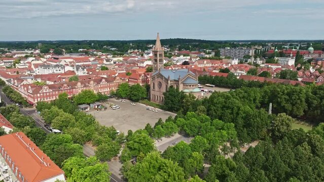 Aerial Drone shot of Catholic Parish Church of St. Peter and Paul ( Katholische Pfarrkirche St. Peter und Paul ) in Potsdam , Germany