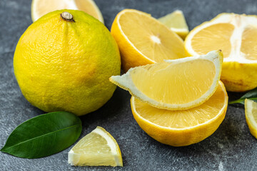 Fresh ripe bergamot orange fruits, fragrant citrus used in earl grey tea, medicine and spa treatments, close up