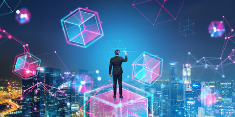 Businessman standing on a big glowing cube, cyberspace and techn