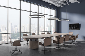 Dark blue meeting room interior with table and armchairs, panoramic window