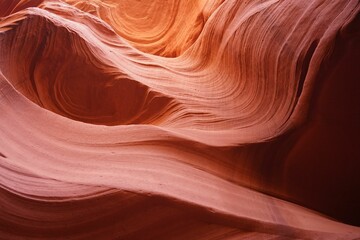 Stunning view of a weathered sandstone rock wall in Antelope Canyon. Arizona, USA.