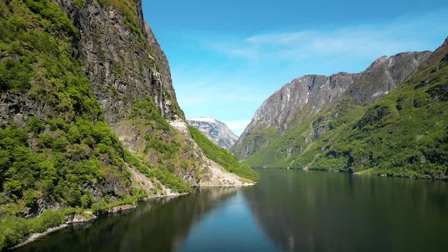 Drone landscape river and Aurland mountain under a blue sky