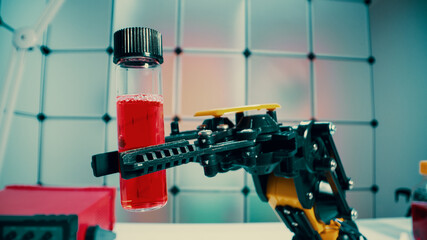 a robot holds a sample of a chemical substance