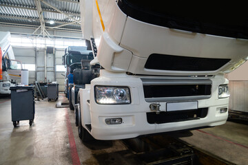 Trucks repair in car service.