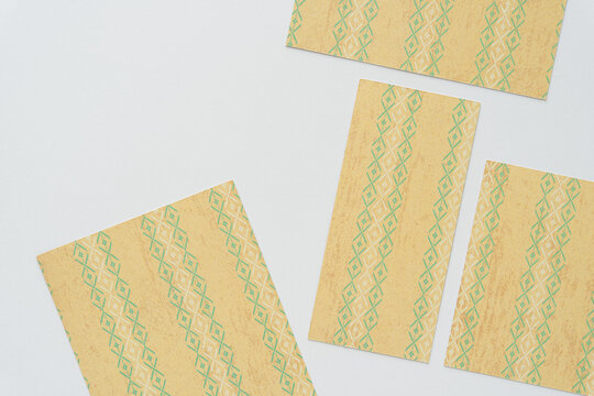paper tags with decorative pattern on blank paper