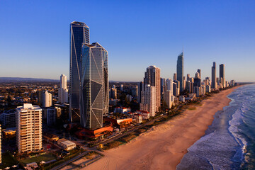 July 29 2023 - Aerial view over Surfers Paradise famous beach and skyline at sunrise. Gold Coast, Australia.