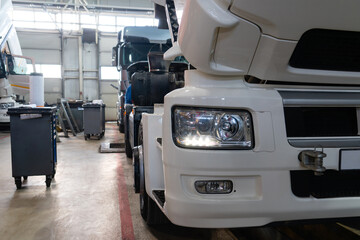 Trucks repair in car service.
