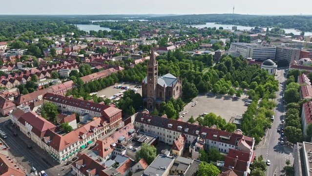 Aerial Drone shot of Catholic Parish Church of St. Peter and Paul ( Katholische Pfarrkirche St. Peter und Paul ) in Potsdam , Germany