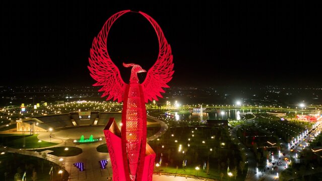 Tashkent, Uzbekistan - December 14, 2022: Huma bird monument in the New Uzbekistan park in Tashkent city at night