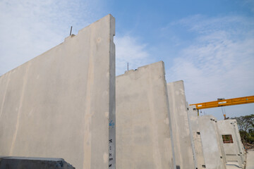 Prefabricated concrete walls for building office buildings and residential houses. Precast reinforced concrete wall panel for construction building.