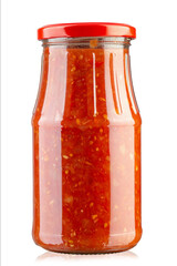 Glass jar of homemade sauce adjika isolated on white background.  File contains clipping path.