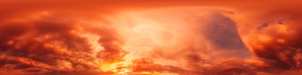 Dramatic sunset sky panorama with bright glowing red pink Cumulus clouds. HDR 360 seamless spherical panorama. Sky dome in 3D, sky replacement for aerial drone panoramas. Weather and climate change.