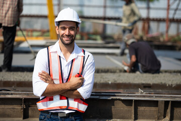 Portrait building and construction worker, Hiapanic latin male wearing safety hard hat helmet...