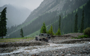 Journey to the mountains. Off-road adventure in the Kyrgyz mountains on a rainy day. © Pavel Kašák