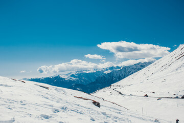 Fototapeta na wymiar Landscape of a mesmerizing snowy mountain slope