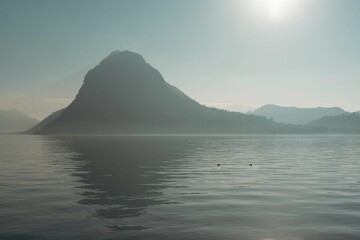 Tranquil lake reflecting the majestic mountains in the background