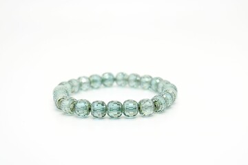 Closeup of a beautiful shiny bracelet isolated on a white background