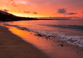 Fototapeta na wymiar Waves on The Sandy Shores of Kaanapali Beach at Sunrise, Kaanapali, Maui, Hawaii, USA