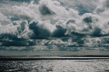 Obraz premium Dark clouds over the sea.