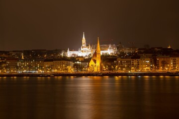Fototapeta na wymiar Stunning nighttime skyline from the banks of the Danube River in Buda, Hungary