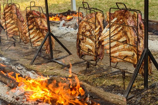 Barbecue ribs on the ground fire. Typical Brazilian barbecue