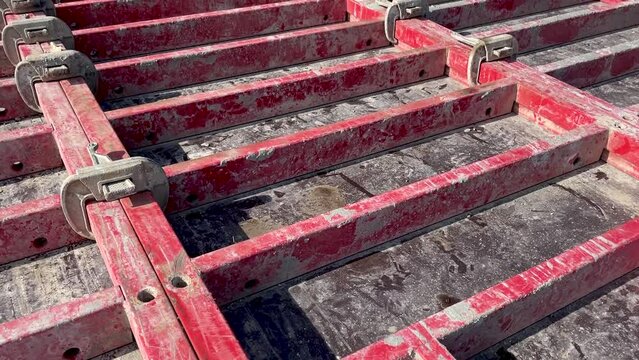 large formwork board connected by clamps from several boards