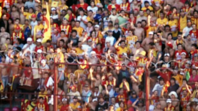 Blurred Soccer Fans during A Football Match at a Soccer Stadium in Argentina. 4K Resolution.