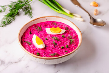 Cold summer soup of beets, yogurt, cucumbers, eggs and dill.
