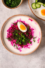 Cold summer soup of beets, kefir, cucumbers, eggs and dill.