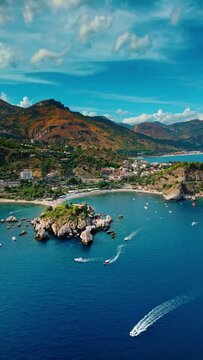 Sunny Day Vertical Drone Footage of Taormina Beaches, Sicily.