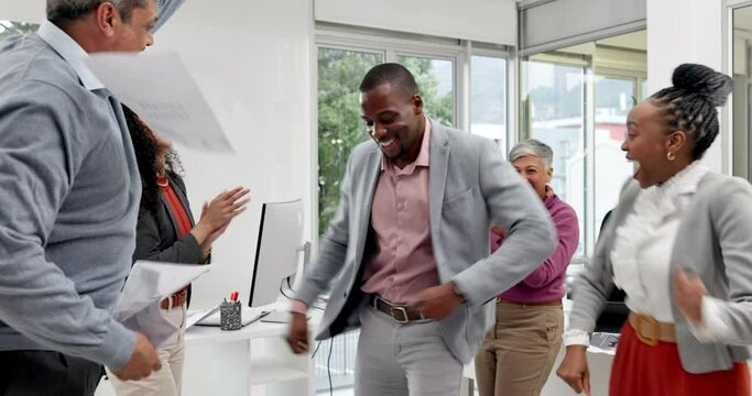 Paperwork in air, celebration and business people dance in office for achievement, success and victory. Teamwork, collaboration and men and women dancing, throw documents and excited for good news