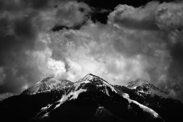 Landscape with snow-covered mountains in black and white