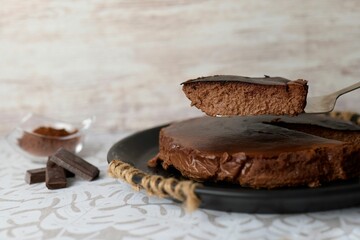 Closeup of a delicious biscuit on the wooden table with a white background