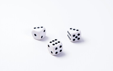 White game dice on a white background. Selective focus.