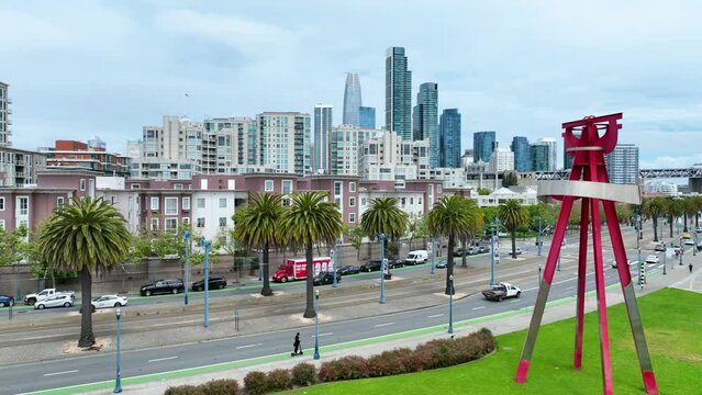 Dolly aerial shot towards downtown San Francisco from south beach park
