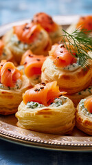 Herbed Cream Cheese and Smoked Salmon Vol Au Vents served on a metal tray, a close-up vertical view. 
