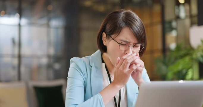 woman is sick at work