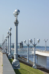 Street lamps in the Volga river port in Samara, Russia. A part of the Samara elevator can be seen in the far.