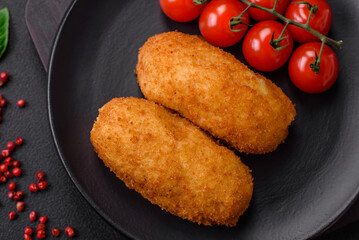 Delicious baked potato cutlet stuffed with chicken and vegetables, spices and salt