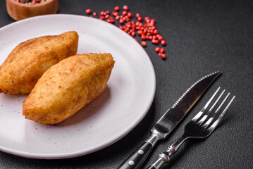 Delicious baked potato cutlet stuffed with chicken and vegetables, spices and salt