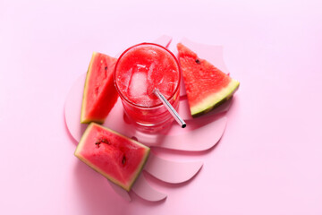 Glass of tasty watermelon fresh on pink background