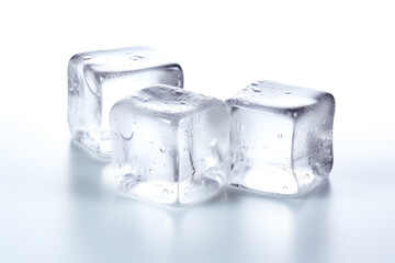 Obraz premium THREE ICE CUBES ON WHITE BACKGROUND.