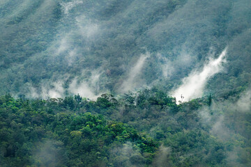 Blue River Provincial Park (Parc provincial de la Rivière Bleue), in Yaté Commune, South Province, New Caledonia, tropical landscape with haze, maquis shrubland, tropical rainforest