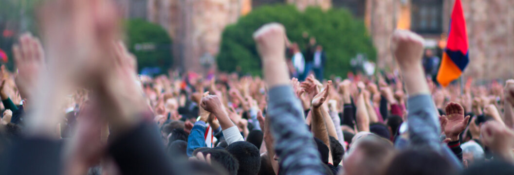 A raised fist of a protest