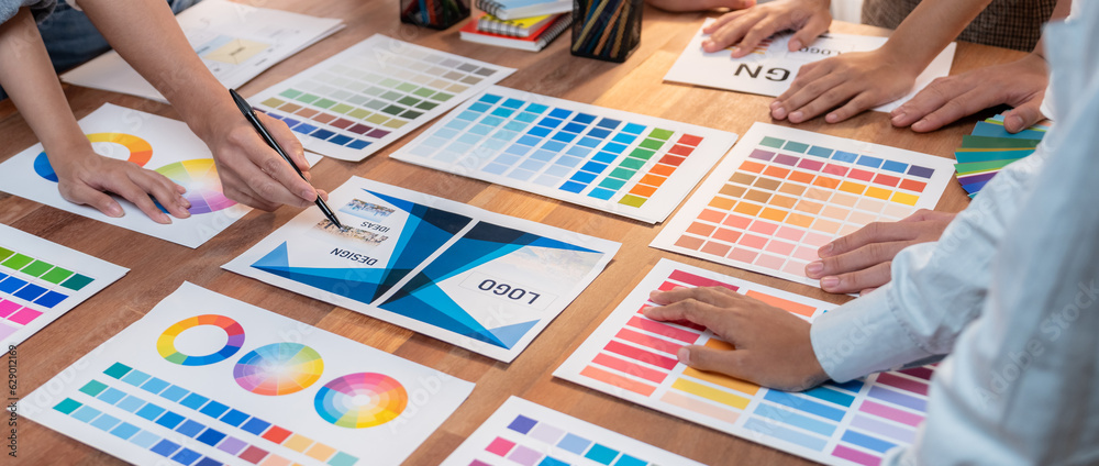 Poster graphic designer brainstorm logo and graphic art at busy creative studio workshop. experiment and br